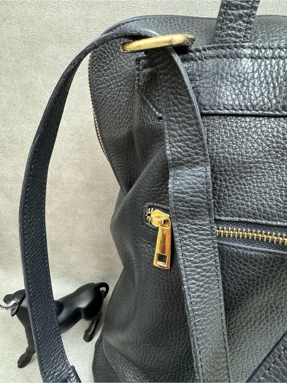 Black Pebbled Leather Backpack with Gold Zipper
